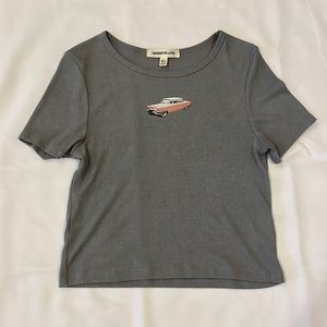 size XL fits like a medium, gray with pinkish / peach colored car